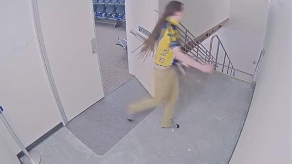 Surveillance footage captured the moment Kyler Efinger burst through an emergency exit door at Salt Lake City Internatio<em></em>nal Airport 