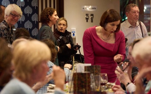 Anneliese Dodds talks to a policewoman inside the Oxford restaurant